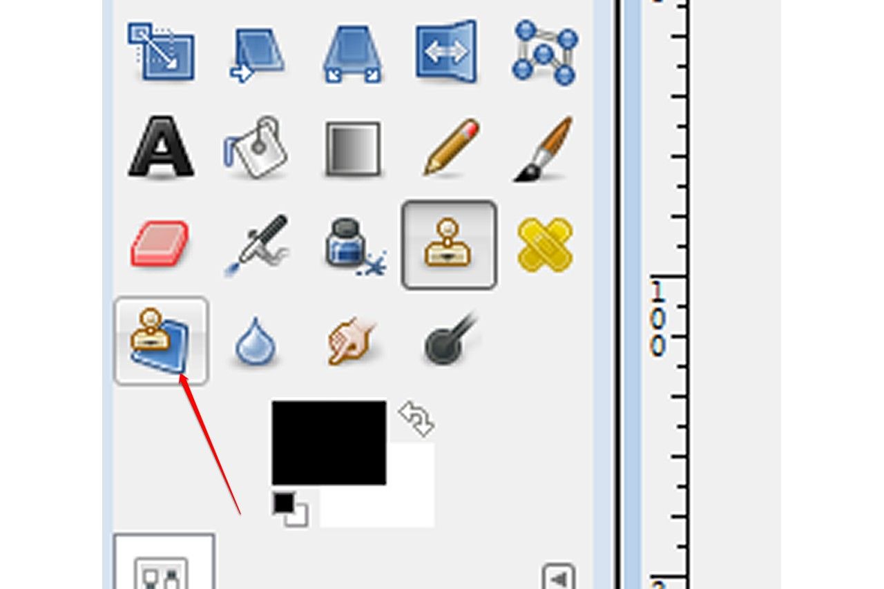 La boîte à outils de GIMP, avec le pinceau Cloner en perspective souligné.