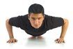 USA Gymnastique recommande serrer votre estomac pendant pompes pour faire travailler vos principaux, les bras, les épaules et le dos.