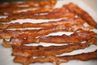 Bacon a 43,3 calories par once et 3,3 grammes de gras