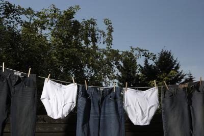 Les hommes blancs's underwear hanging on clothesline.